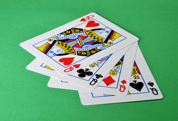 playing cards on green background