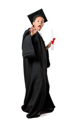 Full body of Little boy graduating is a little bit nervous and scared on isolated white background