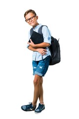 Full body of Student boy with backpack and glasses keeping arms crossed on isolated white background