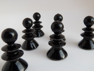Group of black chess pieces
