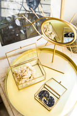 Luxurious home decoration in gold tones, real interior decor details