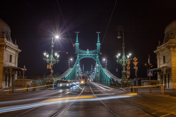 Naklejka na ściany i meble Night view of Liberty Bridge, capital of Hungary.