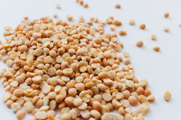 Glass jar with raw dry peas, macro 