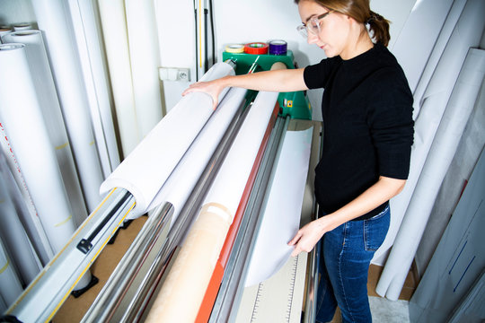 Printing house, service of the printing process. Printing plotter support, the printer operates the machine