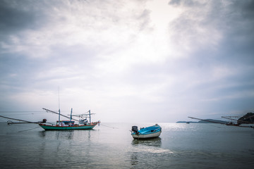 Fototapeta premium Fishing boat on Sairee Beach in the morning, Sairee beach, Chumphon, Thailand.