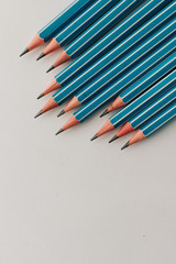 Composition of pencils on white background