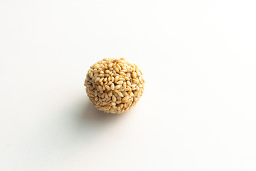 Healthy homemade cookie with nuts and sesame on white background