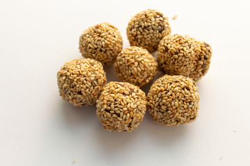 Healthy homemade cookie with nuts and sesame on white background