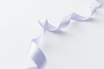 Light ribbon decoration on white background