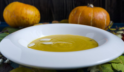 pumpkin soup on a white plate