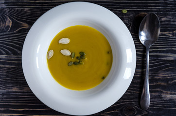 pumpkin soup on a white plate