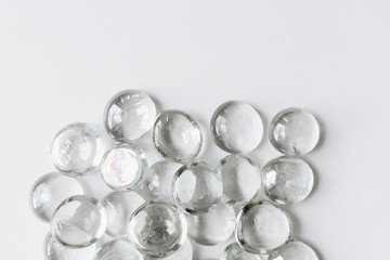 Scattered crystals on white background, beautiful gems