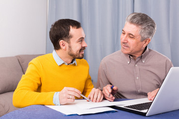 Fototapeta premium Man and sales manager discuss contract