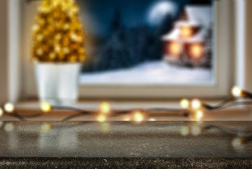 Christmas window sill with wooden desk of free space for your decoration. 