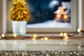 Christmas window sill with wooden desk of free space for your decoration. 