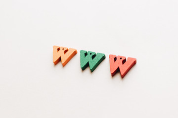 Colorful small wooden W letters