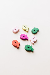 Colorful small wooden Q letters