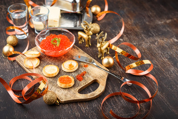 Canape with red salmon caviar