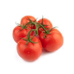 Group red tomatoes whole on a green branch. Isolated on a white background.