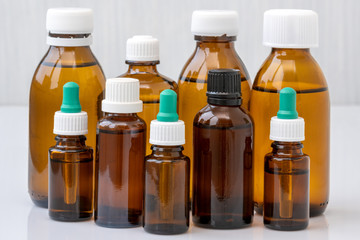 Brown glass bottles with medicine or essential oil
