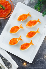 Delicious appetizer with red caviar.