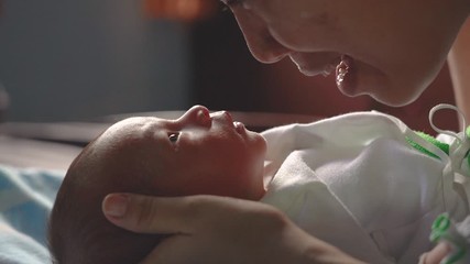 Happy Baby newborn  and mom 