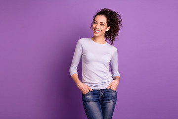 Photo of amazing business lady company representative with beaming toothy smile holding hands in pockets wear pullover isolated purple color background