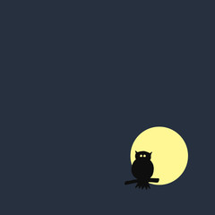 owl eagle on branch on background of full yellow moon and dark sky