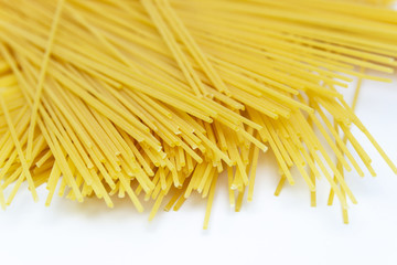 fresh spaghetti isolated over white background. Cooked, fresh spaghetti