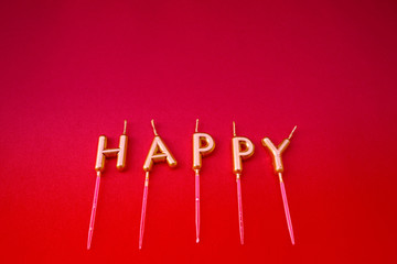 Happy word on red background isolated