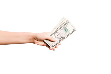 Female hand giving money on white isolated background. Top view of dollar banknotes. Bribe concept. Debt and loan concept