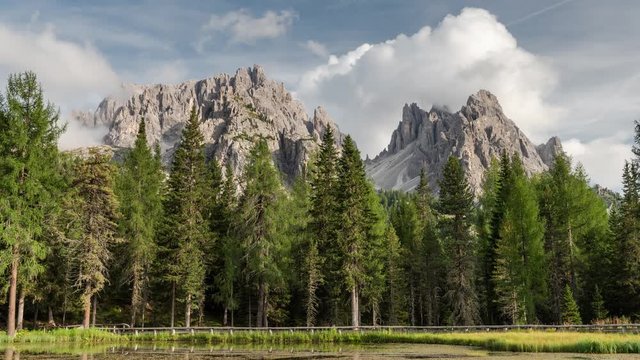Famous Peaks in Tre Cimes of Lavaredo in Italian Dolomites. 4K Time Lapse with Moving Clouds over Mountains Peaks.