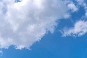 Beautiful cirrus clouds on blue sky on a sunny day background texture