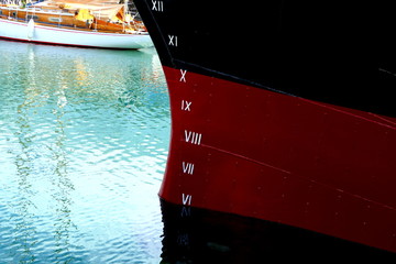 Plimsoll Line painted on a ship hull. An indication of the maximum depth to which the ship may be...