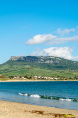 a view of one of the mountain peaks and skys seen from Bolonia beach in Cadiz, spain 