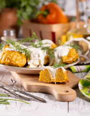 Fresh, hot, corn zucchini muffins with sour cream