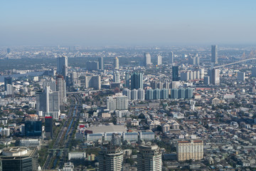 Obraz premium Bangkok modern office buildings, condominium in Bangkok city downtown with sunset sky , Bangkok , Thailand