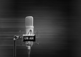 Background with a professional microphone. Place for text