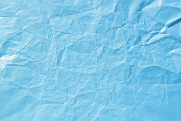 Blue crumpled paper background texture