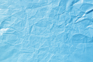 Obraz premium Blue crumpled paper background texture