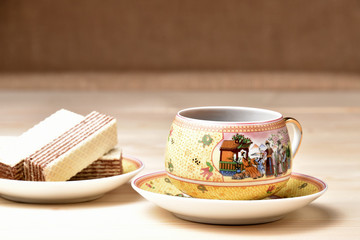 A cup of coffee on a wooden table