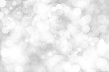 Abstract background with White bokeh on gray background. christmas blurred beautiful shiny Christmas lights.