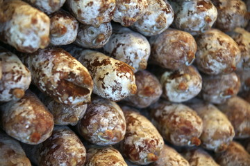 Dry cured saucisson stacked on top of each other