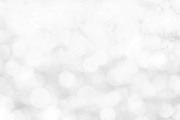 Abstract background with White bokeh on gray background. christmas blurred beautiful shiny Christmas lights.
