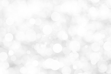 Abstract background with White bokeh on gray background. christmas blurred beautiful shiny Christmas lights.