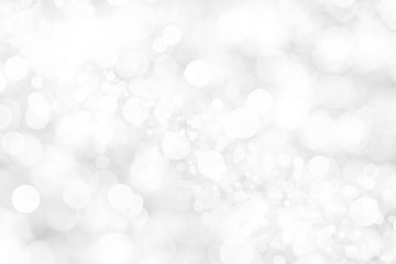Abstract background with White bokeh on gray background. christmas blurred beautiful shiny Christmas lights.