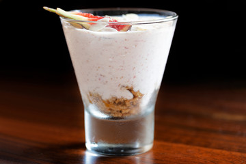Cream and ricotta cheese figs mousse with almonds chips and cookies crumble..