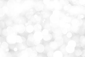 Abstract background with White bokeh on gray background. christmas blurred beautiful shiny Christmas lights.