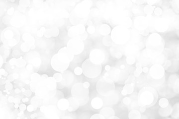 Abstract background with White bokeh on gray background. christmas blurred beautiful shiny Christmas lights.