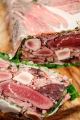 A meat terrine on a wooden board